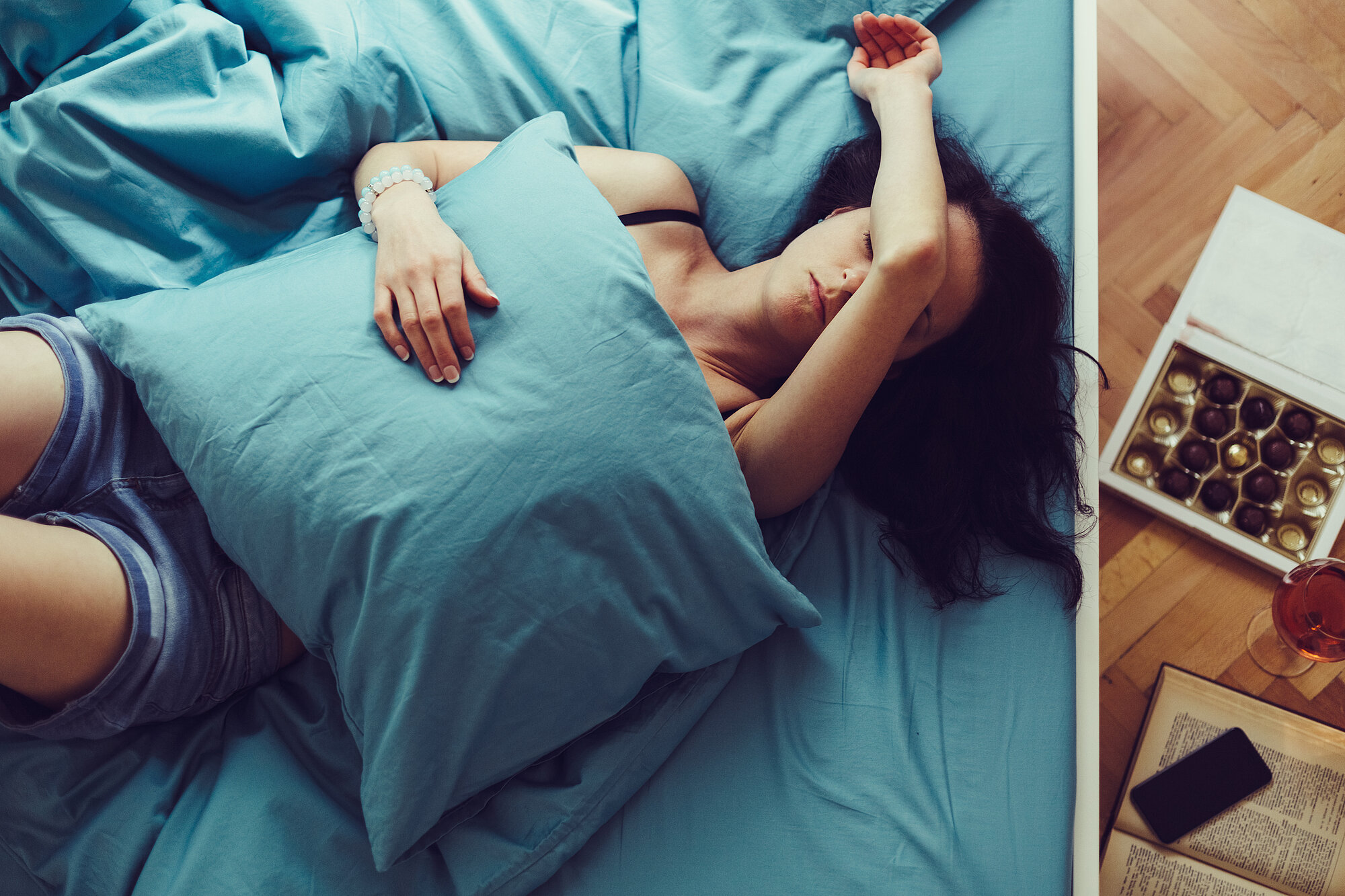 Sick woman sleeping at home